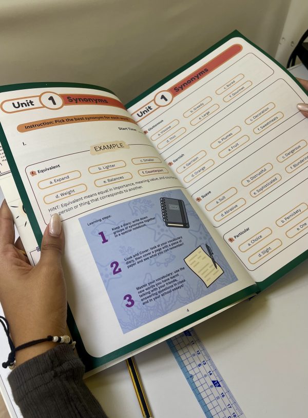 A reader browsing he Brandon Verbal Reasoning workbook